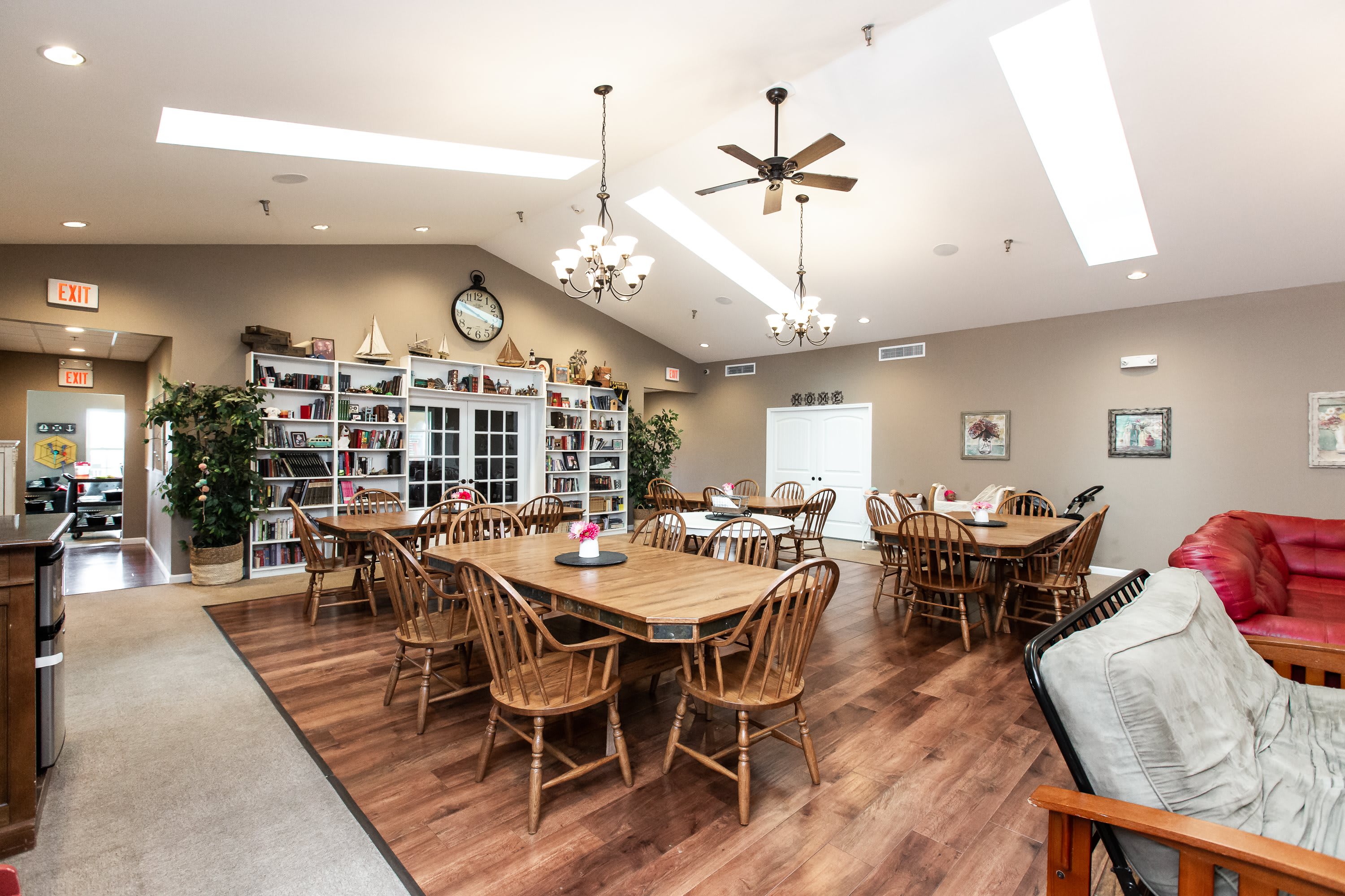 Dining room with skylights and honey wood tables